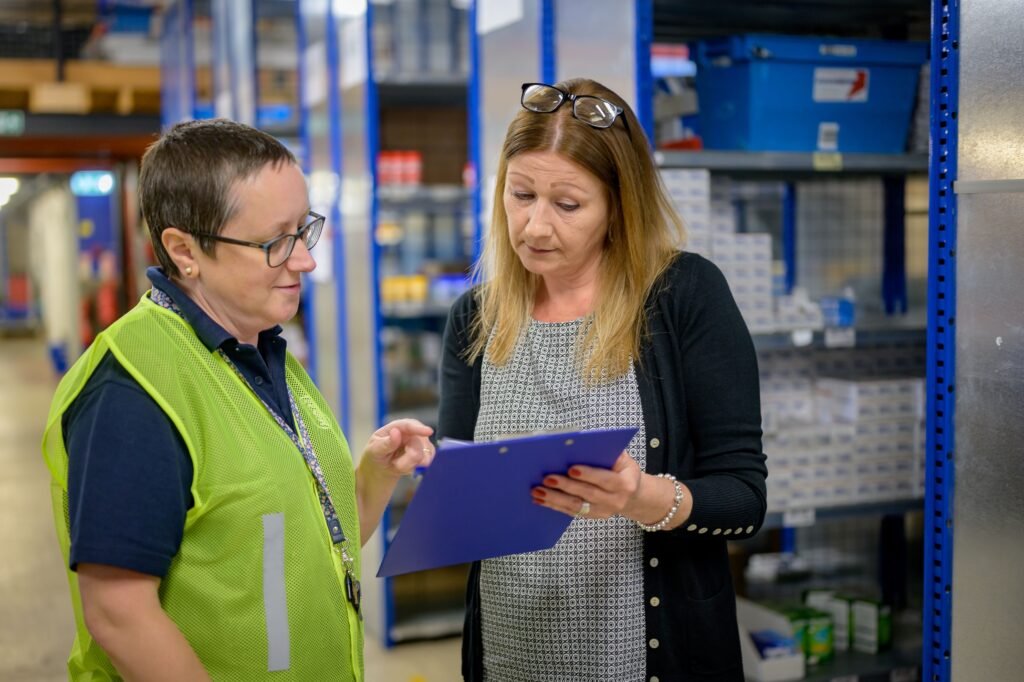 SMETA extension audit process with an auditor reviewing factory compliance