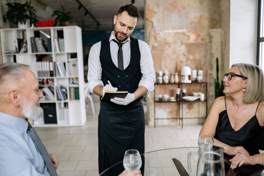 Restaurant server taking a customer order