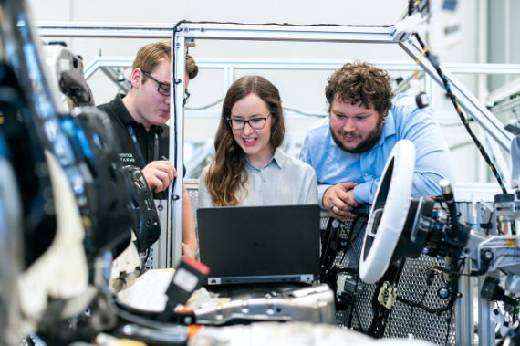 Engineer reviewing a resume and technical qualifications on a laptop